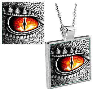 "Golden Dragon Eye"  is an original Kathryn Rutherford work of graphic art reproduced as a silver bezel pendant with 18 inch silver plated chain with bale clasp, dye sublimation printed on high gloss aluminum set inside a silver plated bezel.
