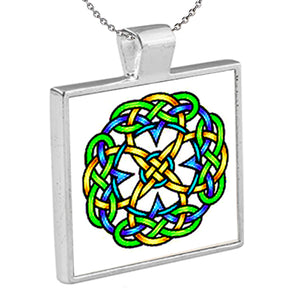"Blue, Green, and Yellow Celtic Knot" is an original Kathryn Rutherford work of graphic art reproduced as a silver bezel pendant with 18 inch silver plated chain with bale clasp.  Original graphic art design is dye sublimation printed on high gloss aluminum set inside a silver plated bezel.