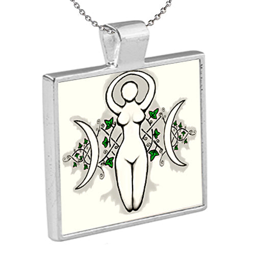 Moon Goddess is an original Kathryn Rutherford graphic design of the Sacred Goddess and Crescent Moons dye sublimation printed on a silver plated bezel pendant with chain. 