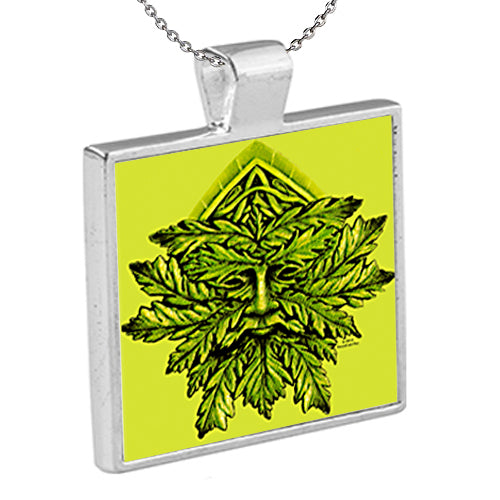 Greenman is an original work of Kathryn Rutherford fine art dye sublimation printed on an aluminum insert inside a silver plated bezel pendant with chain. 